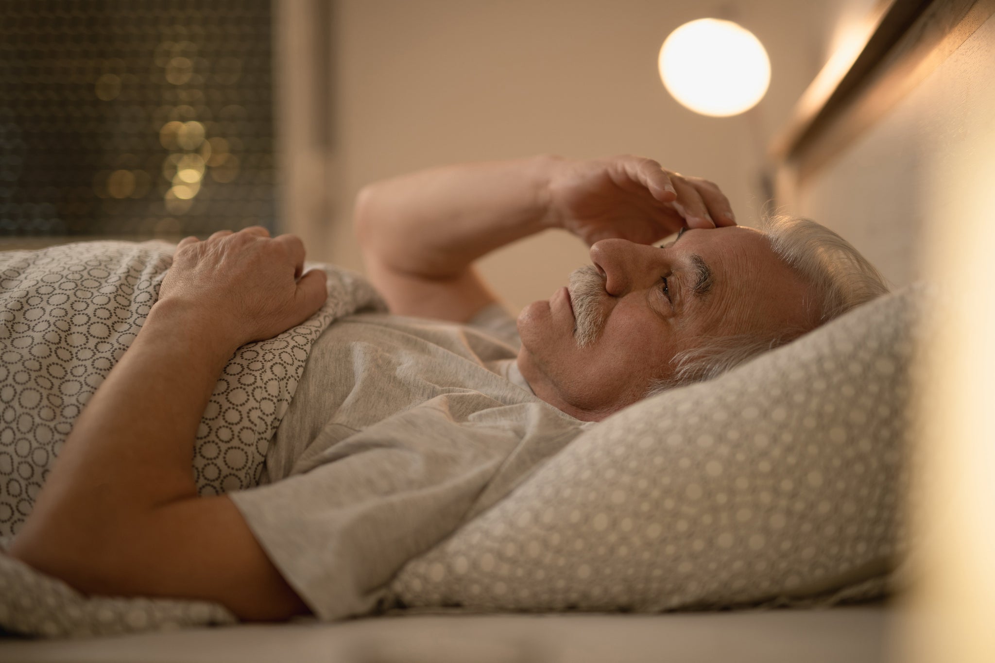 The man sleep on the bed