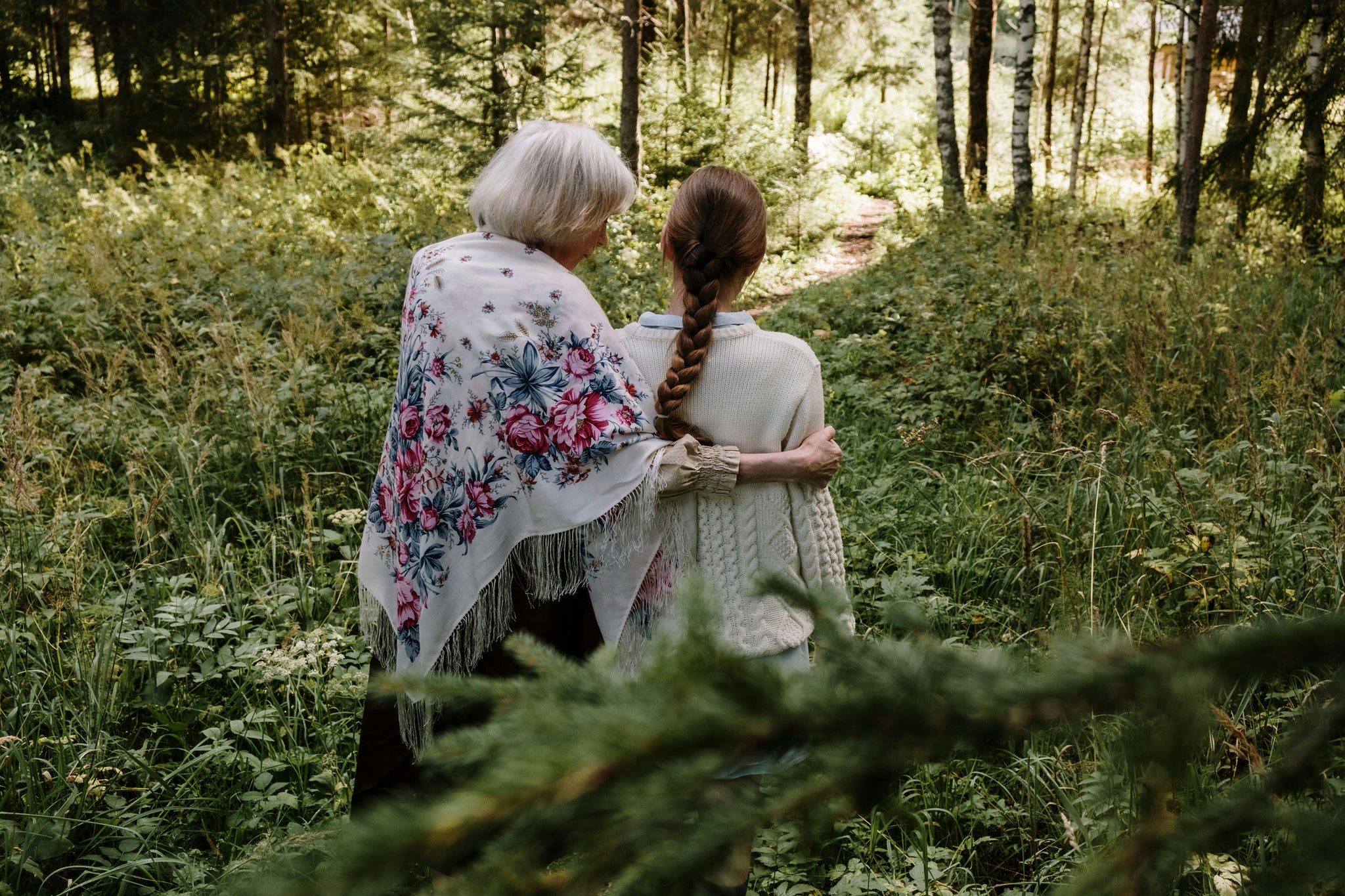 Grandchildren walking in the forest