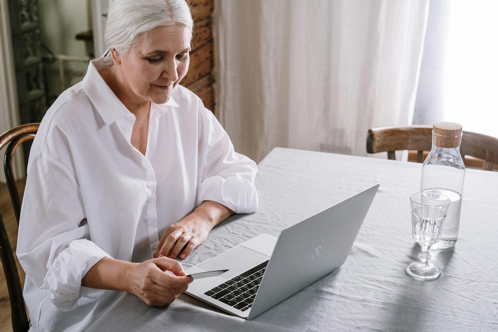 Woman working at a desk.