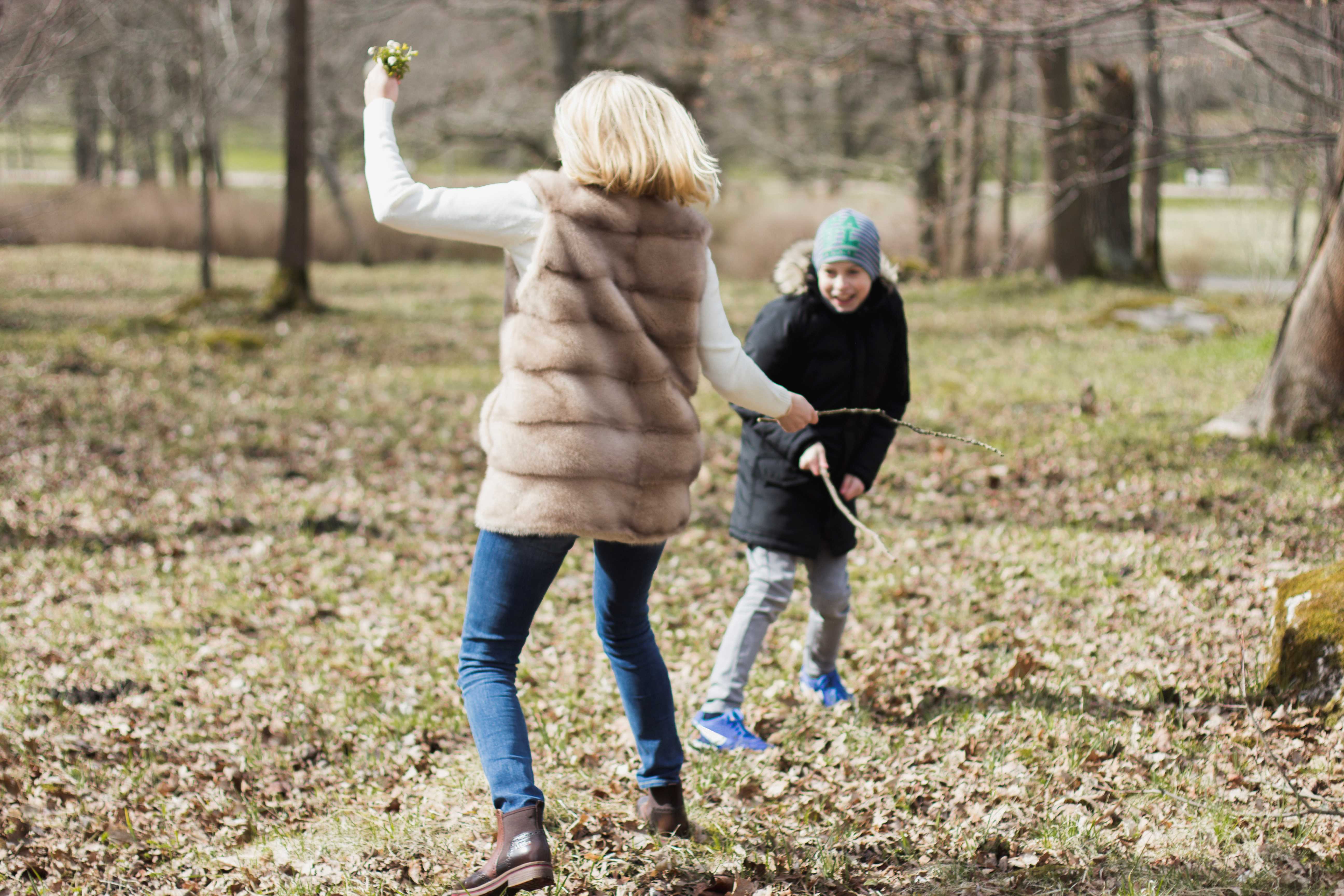 Mother and daughter playing water